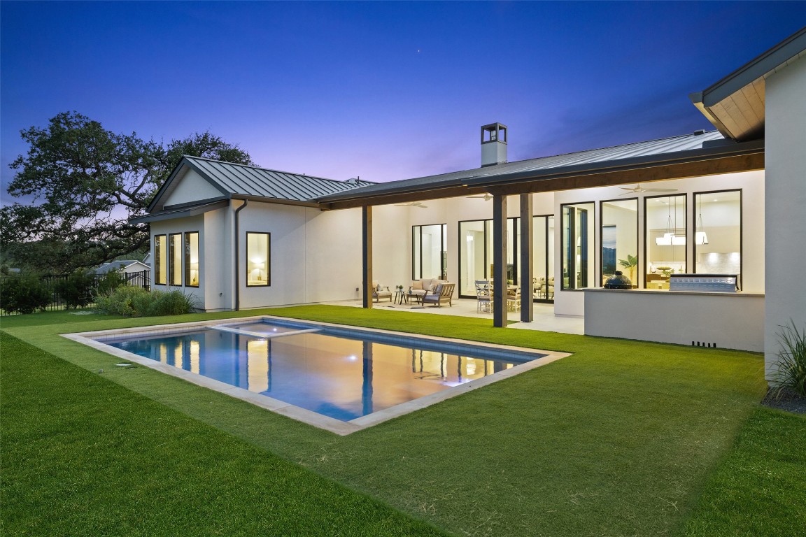 5813 Horizon Vista Way Austin, TX 78738 - Photo 30 of 38 a view of a house with pool and a yard