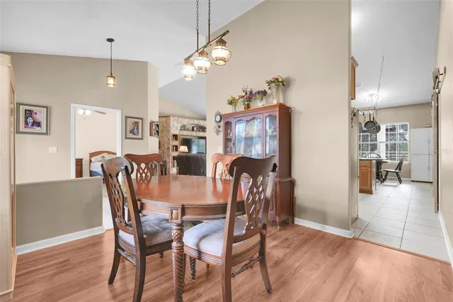 a dining room with furniture and window