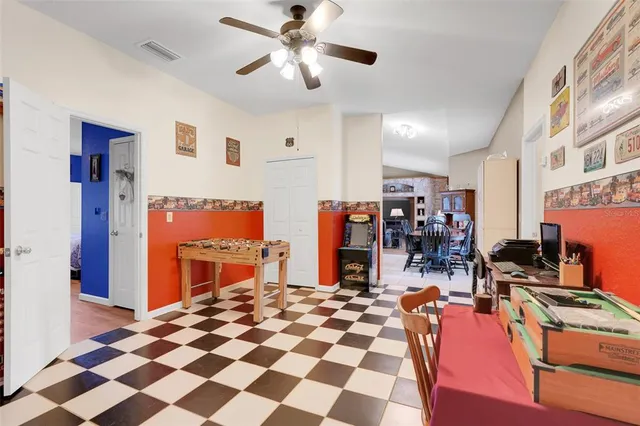 a bathroom with a sink vanity and mirror