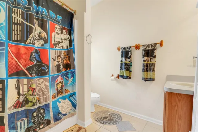 a utility room with dryer washer and a window