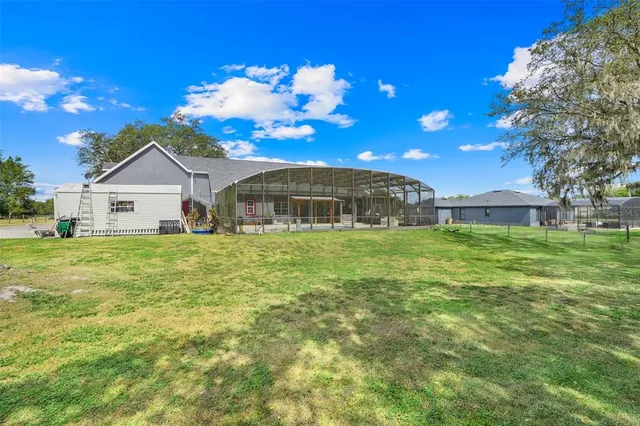 a view of a houses with a yard