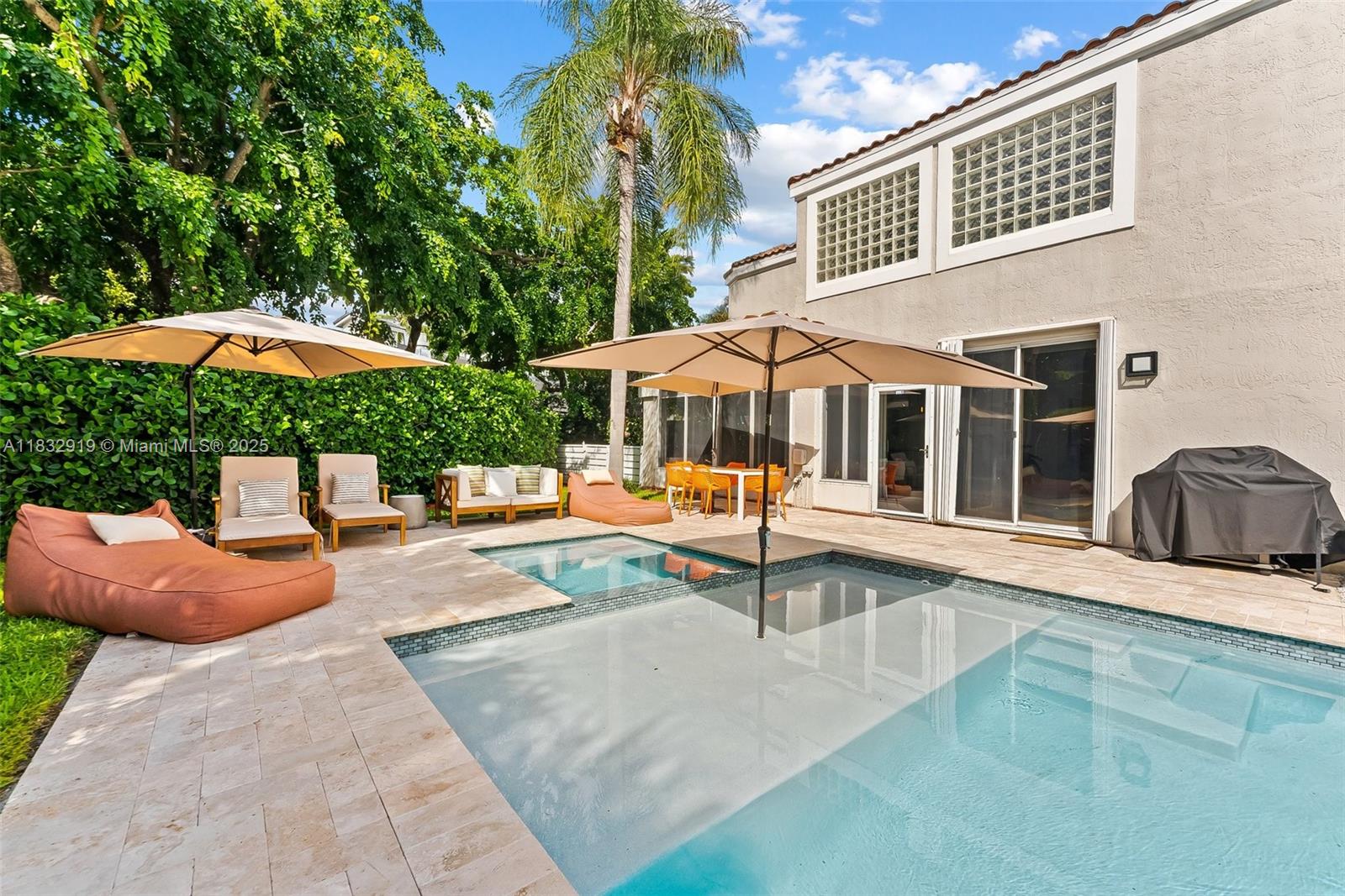 17723 Tiffany Trace Drive Boca Raton, FL 33487 - Photo 24 of 44 a view of a house with backyard and swimming pool