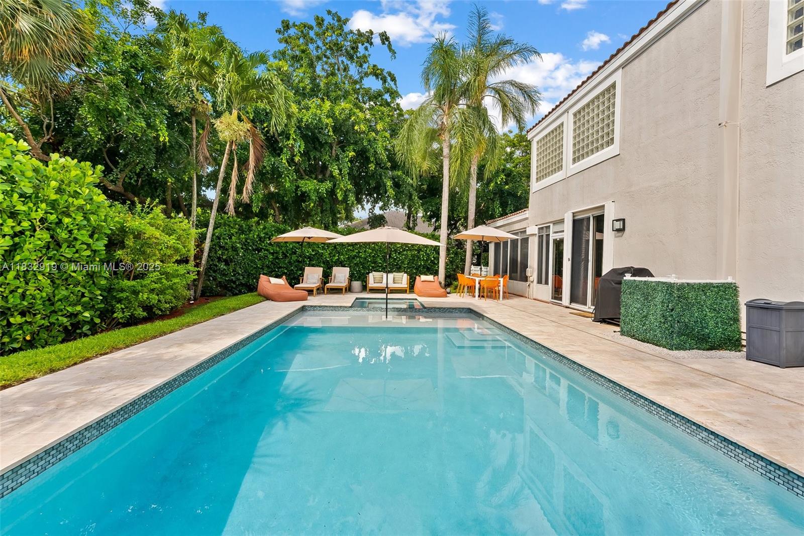 17723 Tiffany Trace Drive Boca Raton, FL 33487 - Photo 26 of 44 a view of a swimming pool with a patio