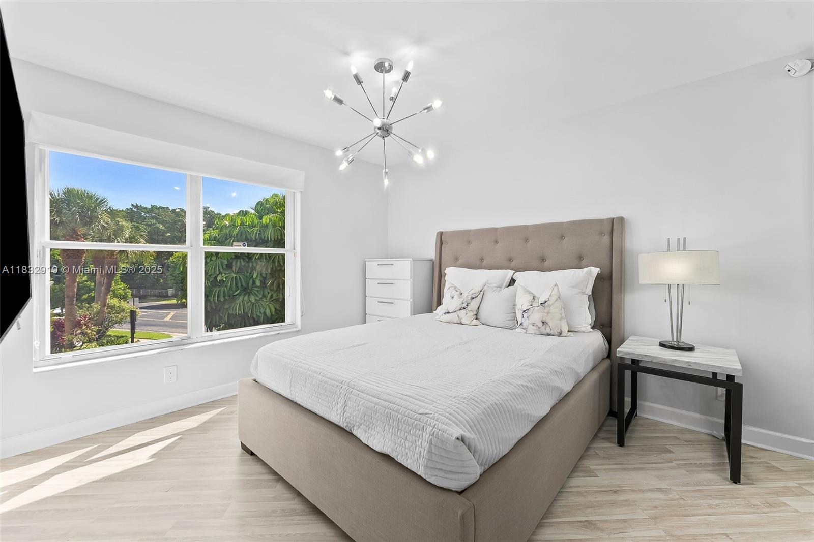 17723 Tiffany Trace Drive Boca Raton, FL 33487 - Photo 29 of 44 a bedroom with a large bed and a window