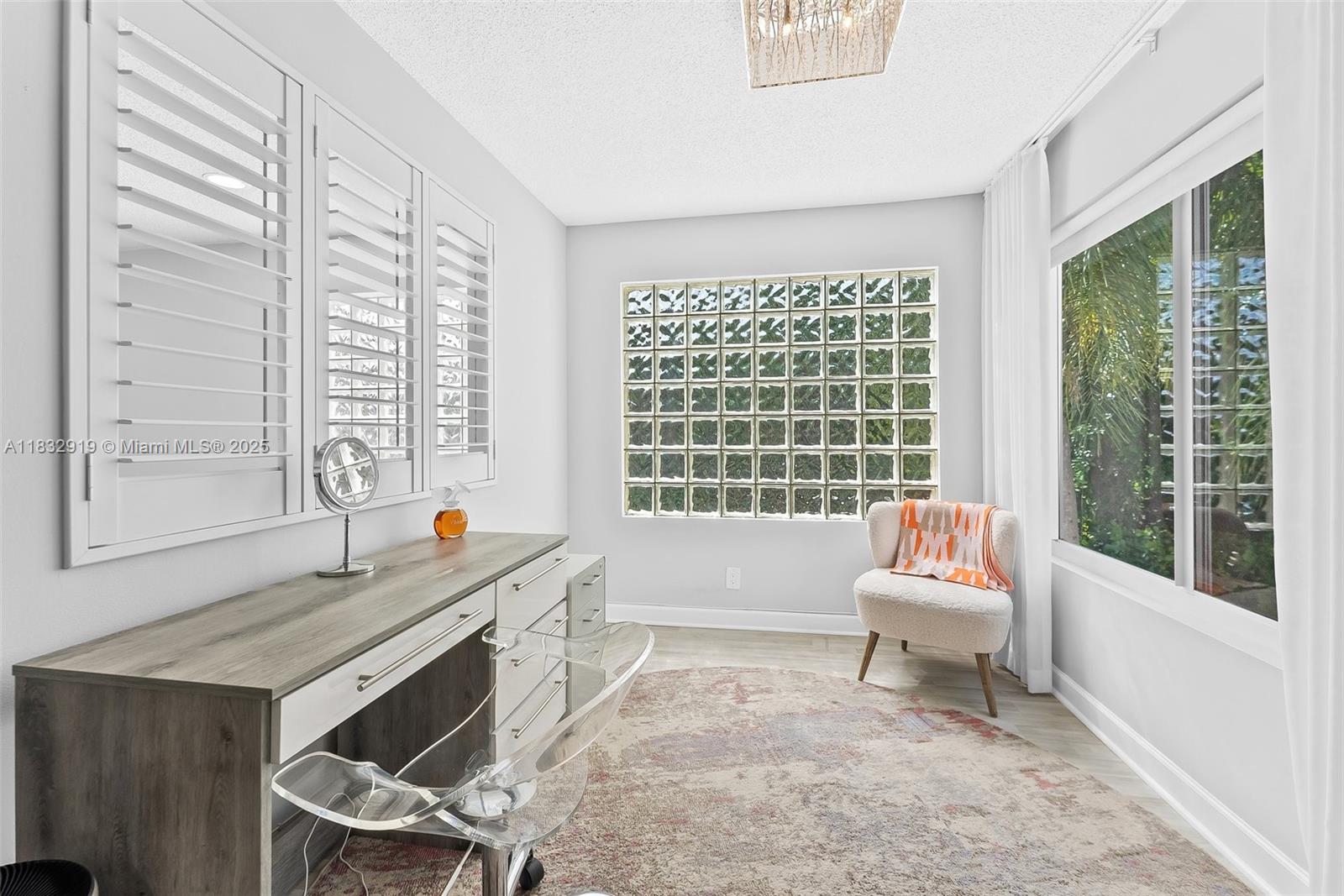 17723 Tiffany Trace Drive Boca Raton, FL 33487 - Photo 32 of 44 a living room with furniture and a window