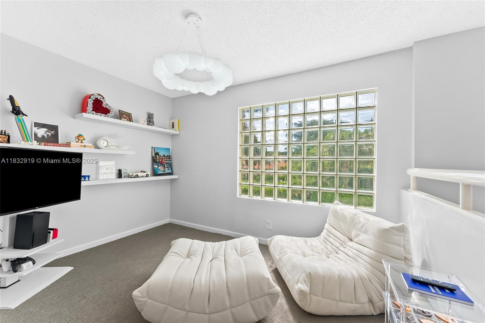17723 Tiffany Trace Drive Boca Raton, FL 33487 - Photo 44 of 44 a bedroom with a bed and a large window