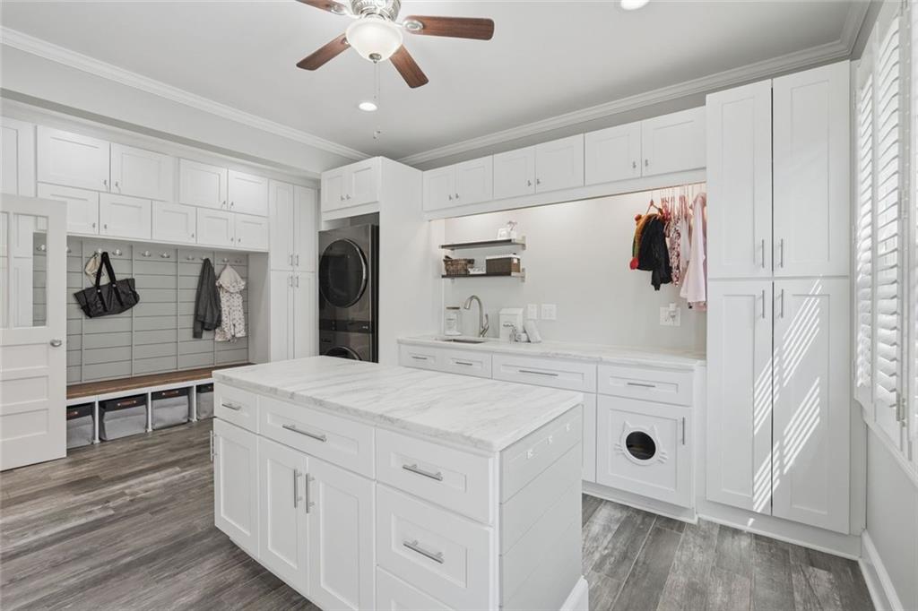 215 Bayfield Court Milton, GA 30004 - Photo 20 of 62 a view of kitchen with cabinets and wooden floor