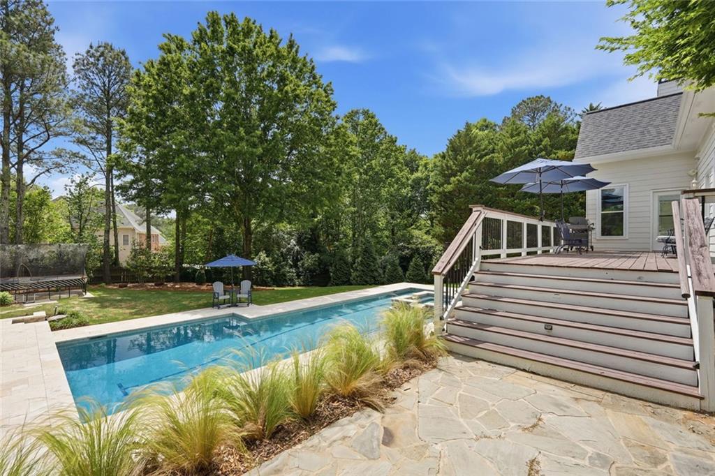 215 Bayfield Court Milton, GA 30004 - Photo 49 of 62 a view of a house with swimming pool