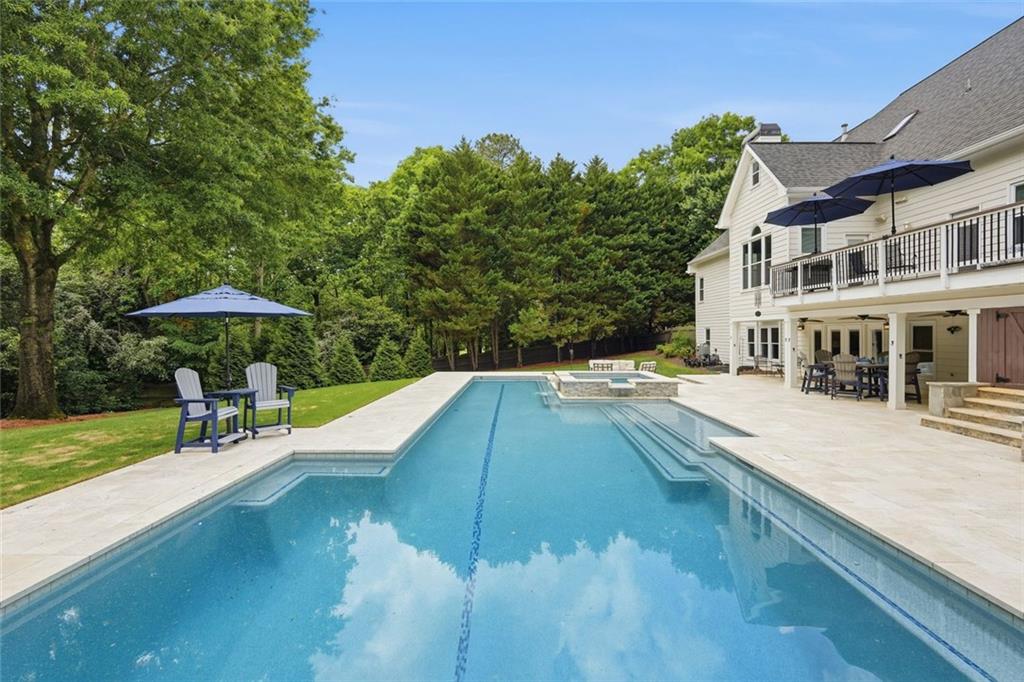215 Bayfield Court Milton, GA 30004 - Photo 53 of 62 a view of a house with pool and sitting area