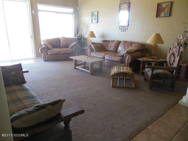 22 Virrey Court Rio Rico, AZ 85648 - Photo 5 of 14 a living room with furniture and a window