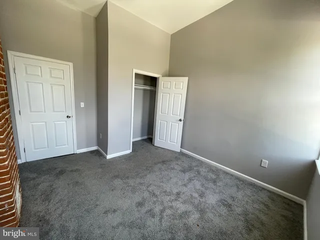 an empty room with closet