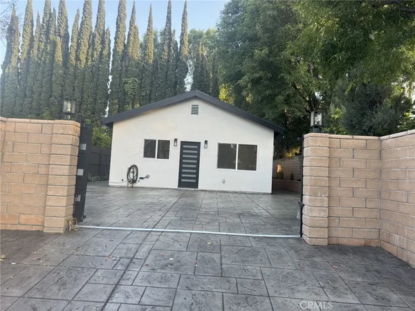 a view of a house with a garage