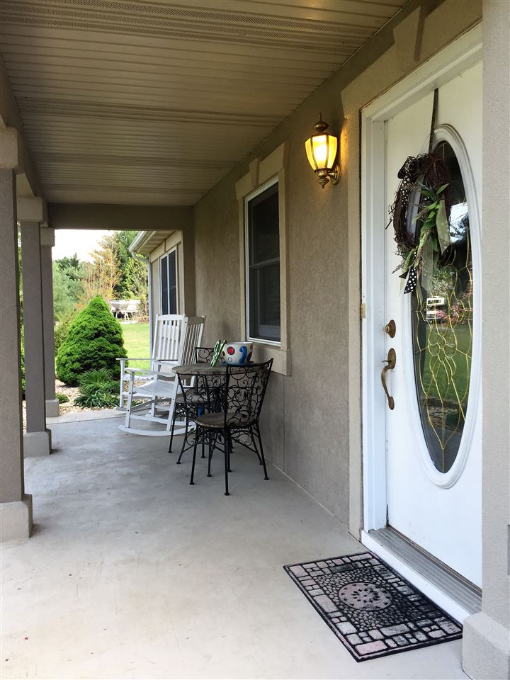 34 Swartzel Shop Road Staunton, VA 24401 - Photo 12 of 47 a view of outdoor dining space with a table and chairs