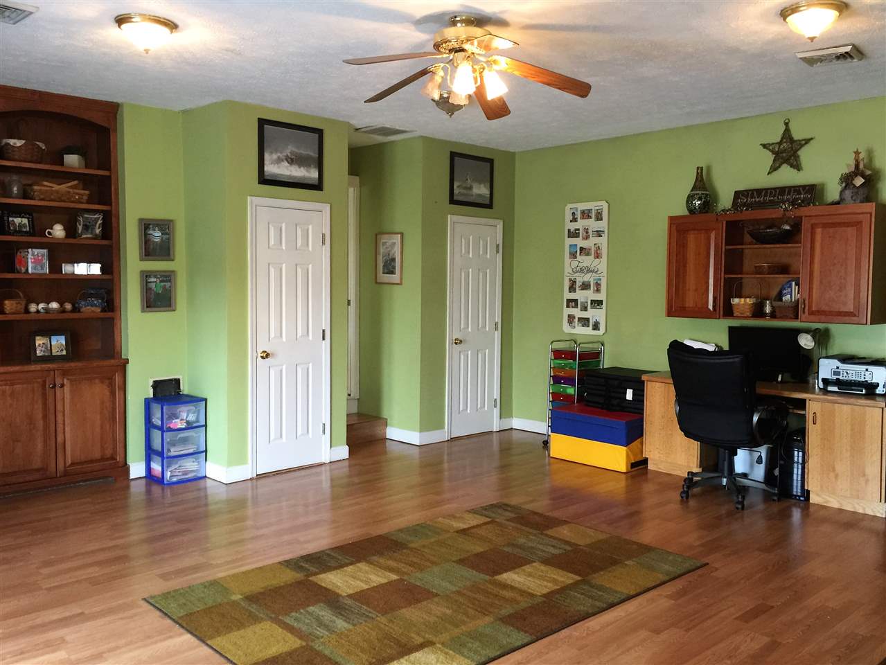 34 Swartzel Shop Road Staunton, VA 24401 - Photo 27 of 47 a view of a livingroom with furniture a flat screen tv and wooden floor