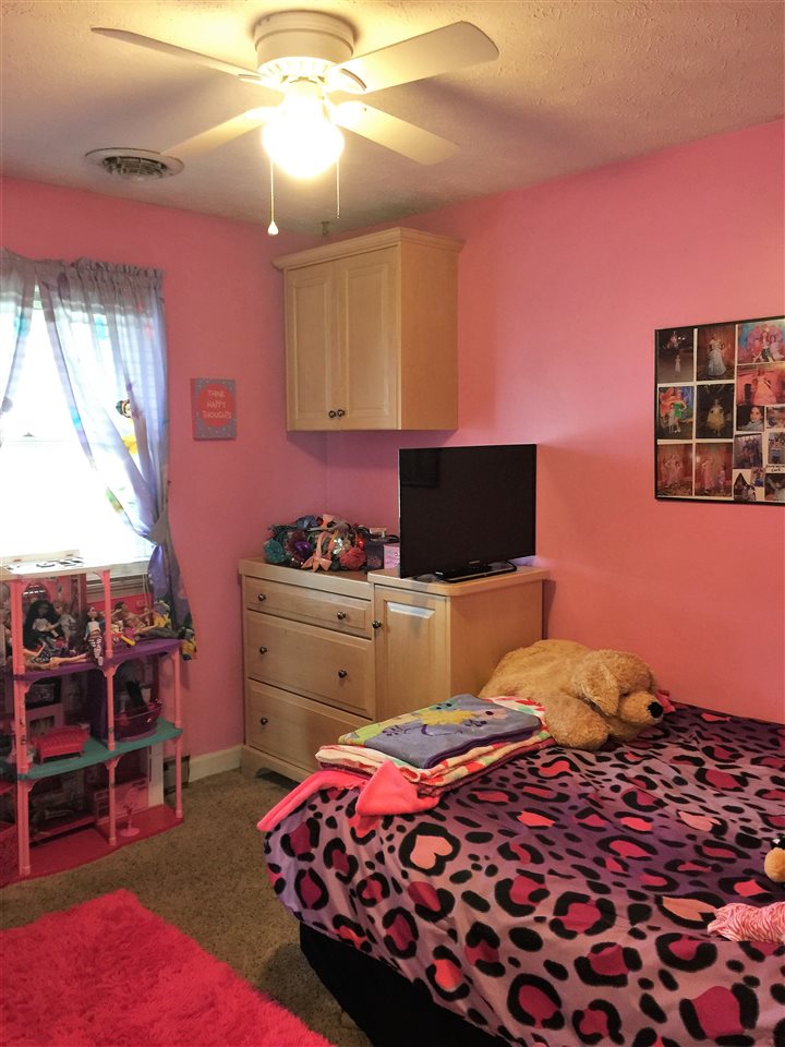 34 Swartzel Shop Road Staunton, VA 24401 - Photo 30 of 47 a bedroom with a bed and a window
