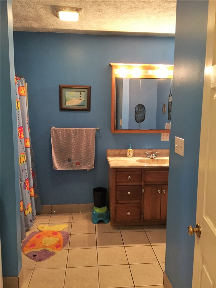 34 Swartzel Shop Road Staunton, VA 24401 - Photo 33 of 47 a bathroom with a sink and a mirror
