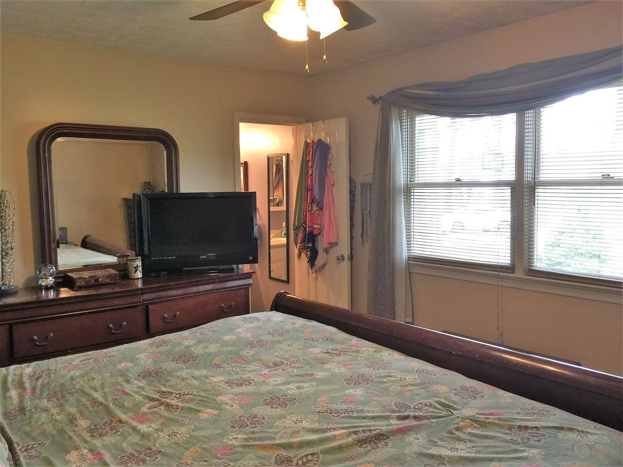 34 Swartzel Shop Road Staunton, VA 24401 - Photo 38 of 47 a bedroom with a bed and a flat screen tv