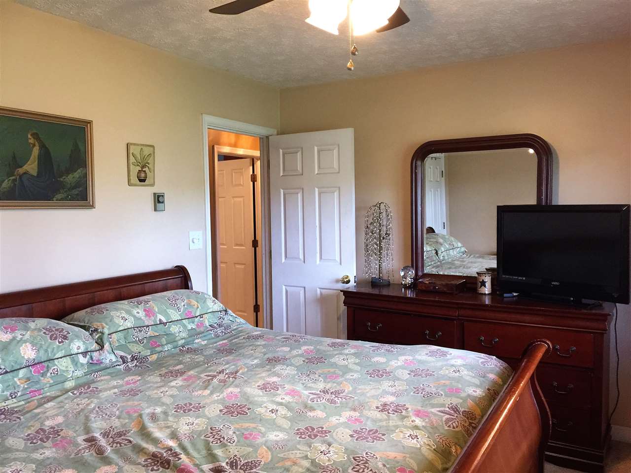 34 Swartzel Shop Road Staunton, VA 24401 - Photo 39 of 47 a bedroom with a bed and a flat screen television
