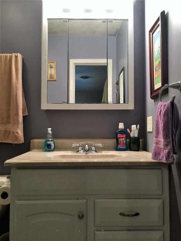 34 Swartzel Shop Road Staunton, VA 24401 - Photo 40 of 47 a bathroom with a sink and a mirror