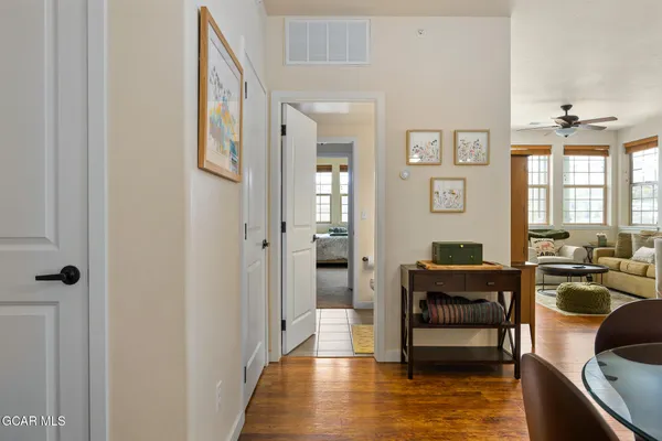 a view of a livingroom with furniture and window