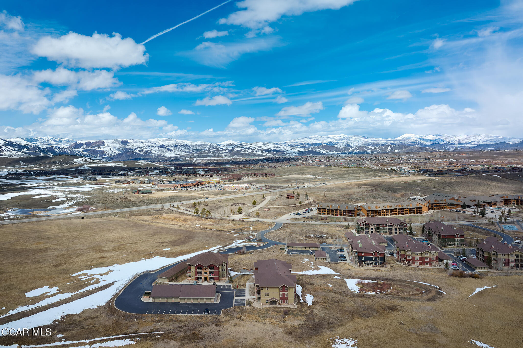 164 Village Road, Unit H203 Granby, CO 80446 - Photo 36 of 38 a view of a lake with a city