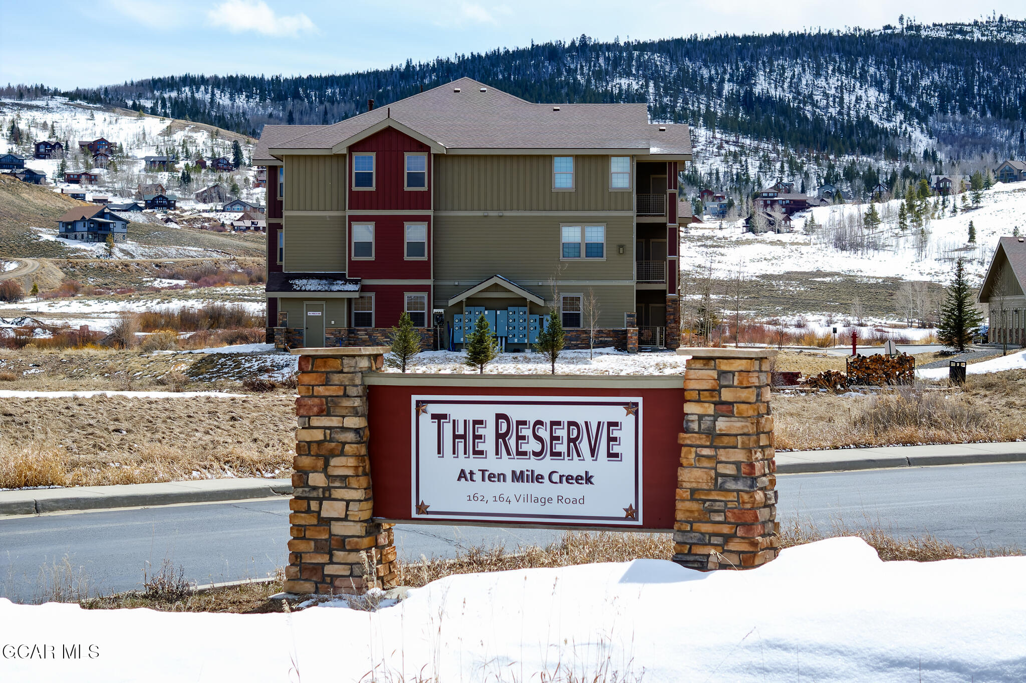 164 Village Road, Unit H203 Granby, CO 80446 - Photo 38 of 38 a sign on the side of a building