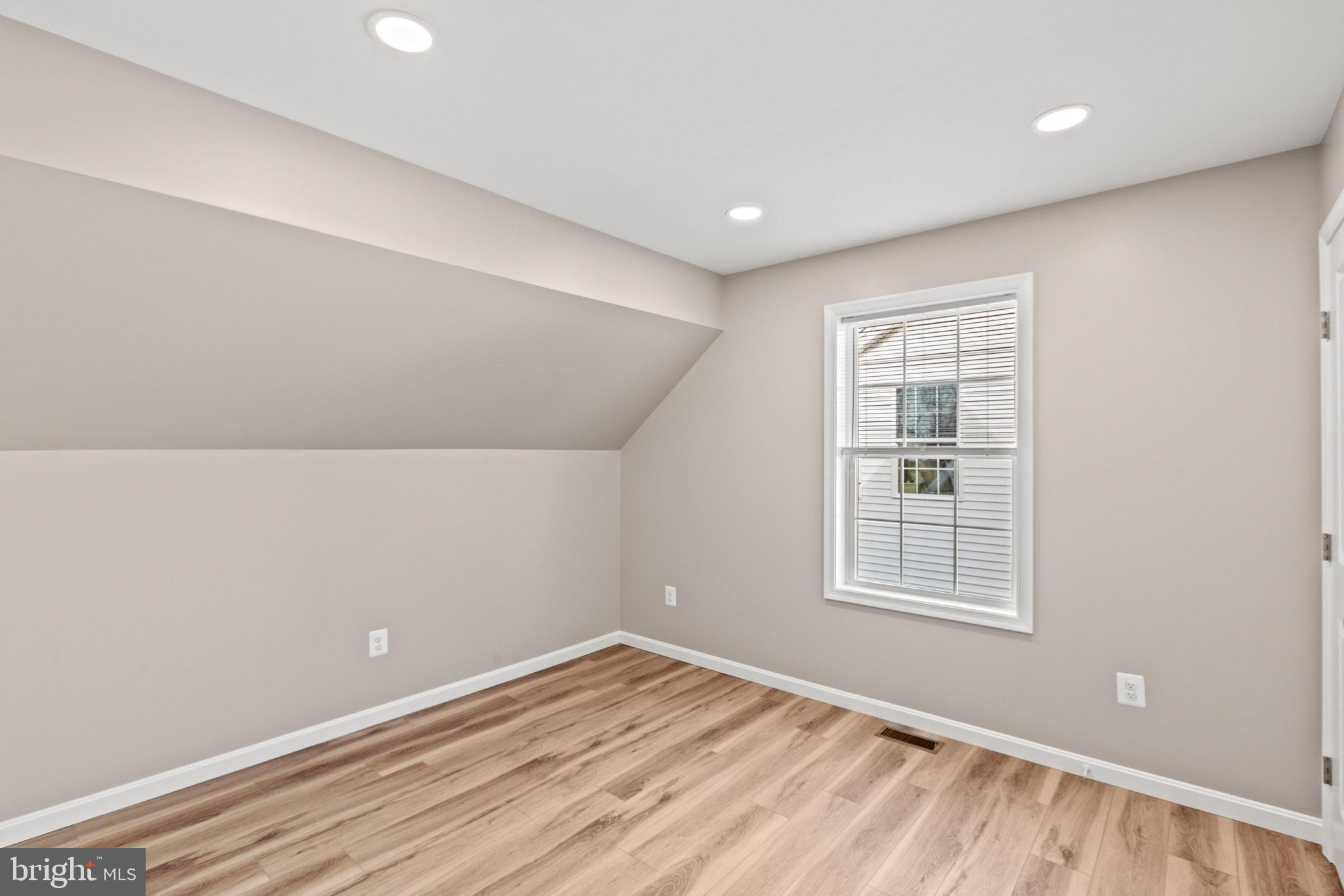 22802 Lawrence Avenue Leonardtown, MD 20650 - Photo 18 of 28 an empty room with windows