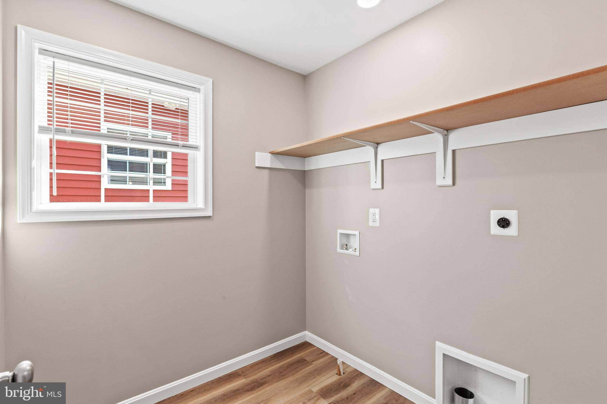 22802 Lawrence Avenue Leonardtown, MD 20650 - Photo 22 of 28 a view of a small space with wooden floor and a window