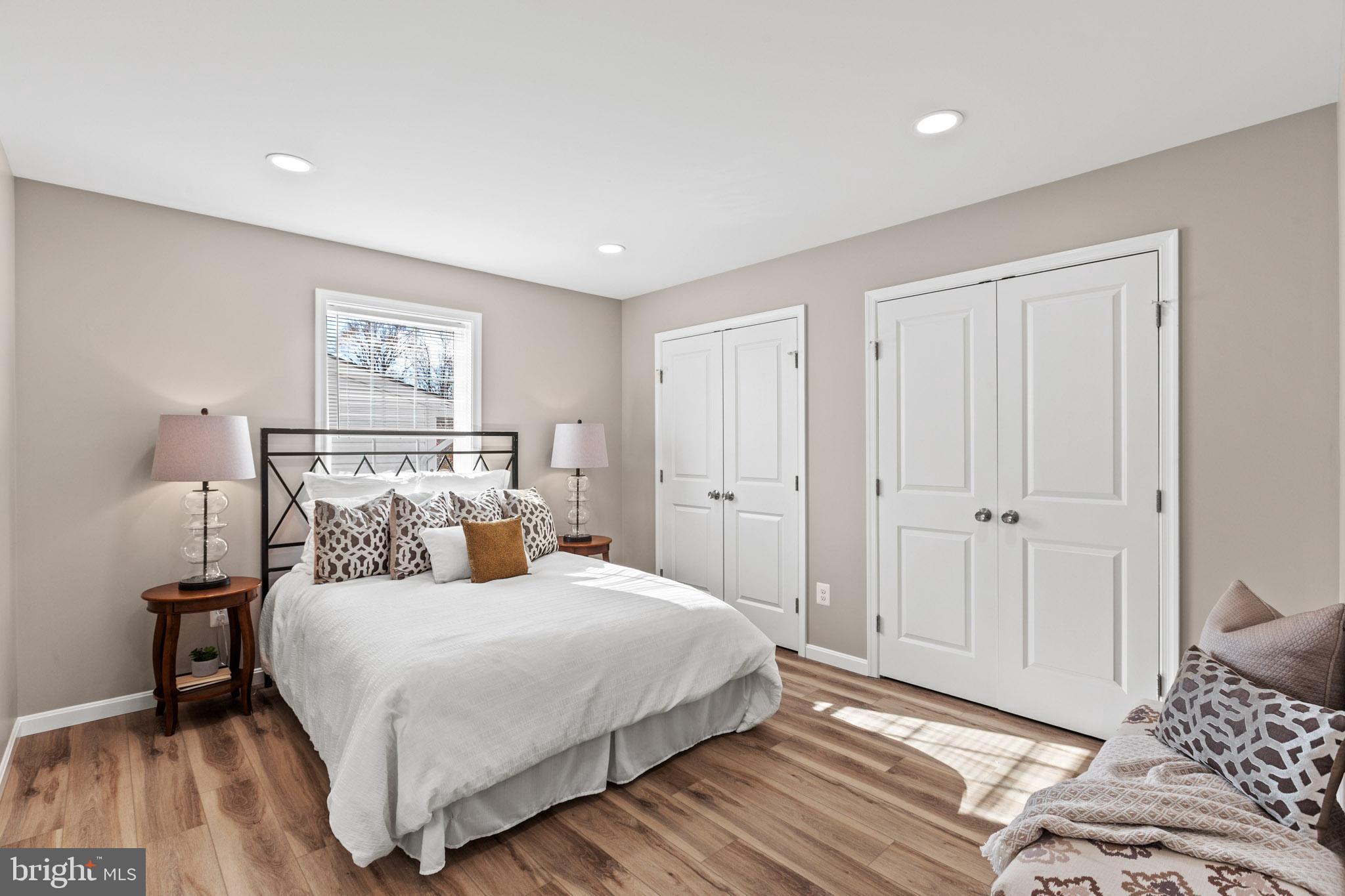 22802 Lawrence Avenue Leonardtown, MD 20650 - Photo 23 of 28 a bedroom with a bed and a mirror