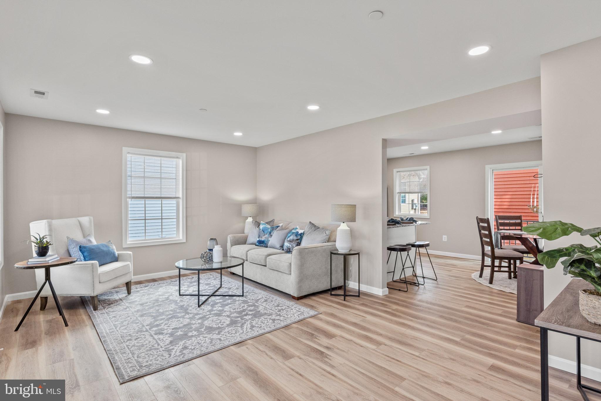 22802 Lawrence Avenue Leonardtown, MD 20650 - Photo 5 of 28 a living room with furniture and wooden floor