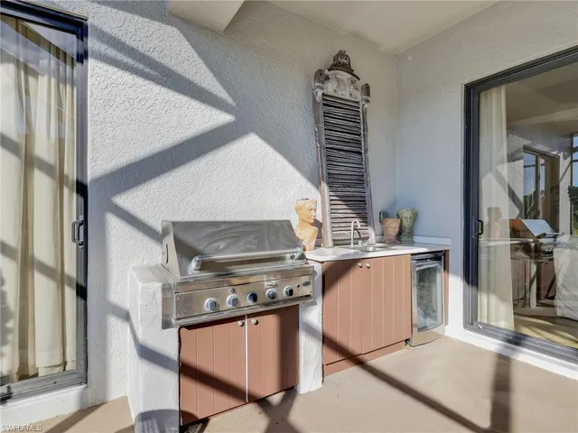 a view of an outdoor dining space with furniture