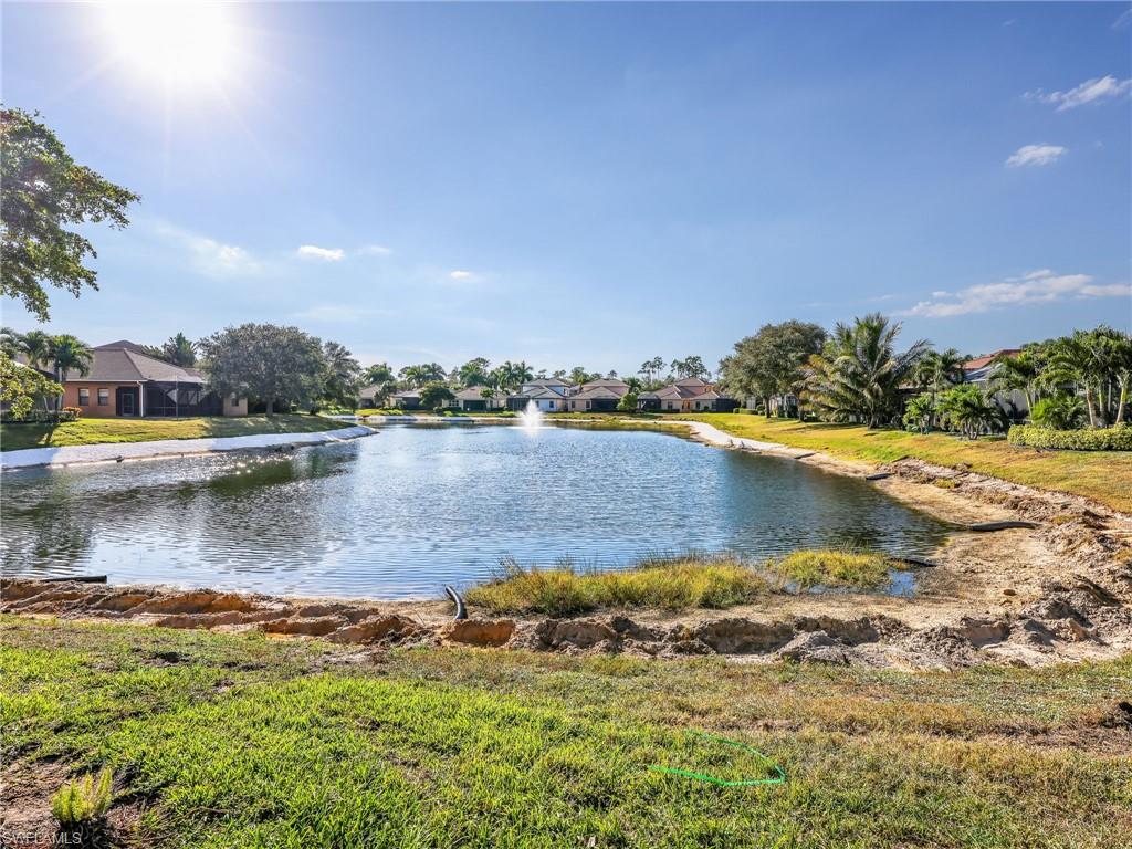 1365 Serrano Circle Naples, FL 34105 - Photo 26 of 46 Water view with nearby suburban area