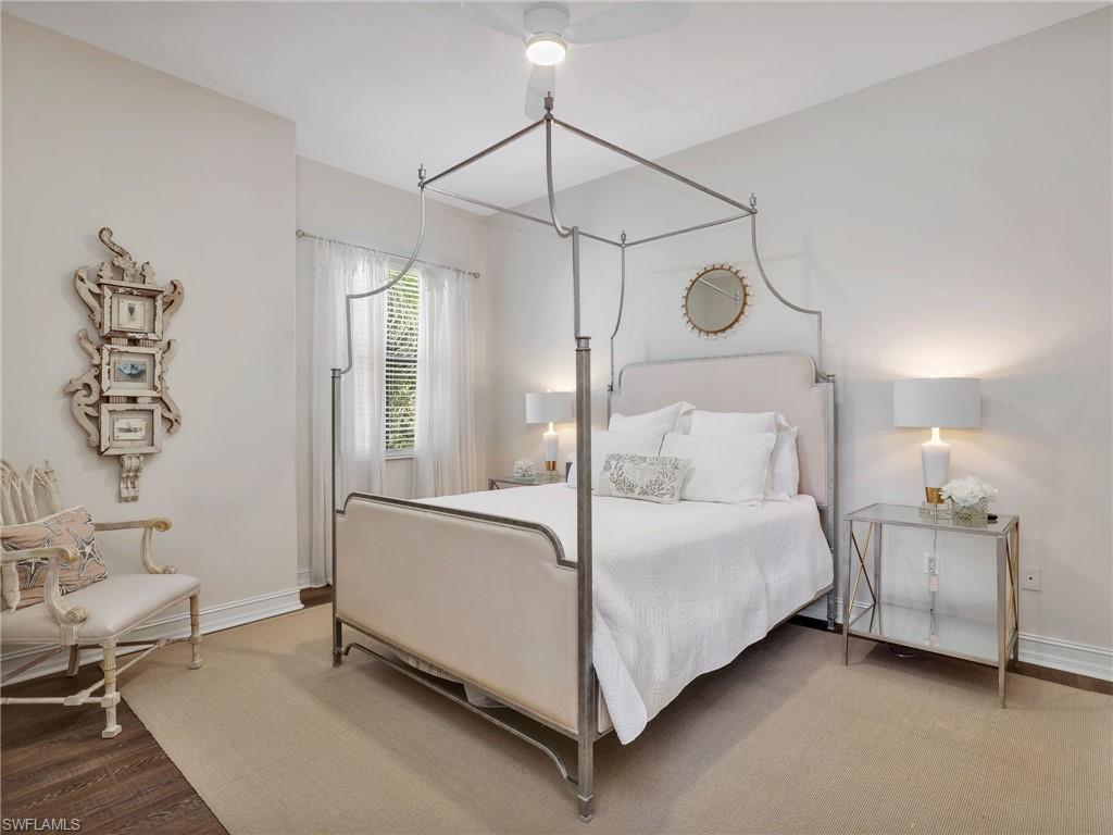 1365 Serrano Circle Naples, FL 34105 - Photo 39 of 46 Bedroom with baseboards and ceiling fan