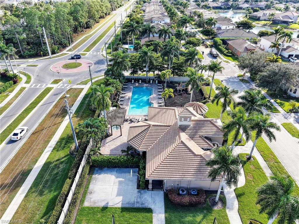 1365 Serrano Circle Naples, FL 34105 - Photo 41 of 46 Aerial view of residential area with a pool