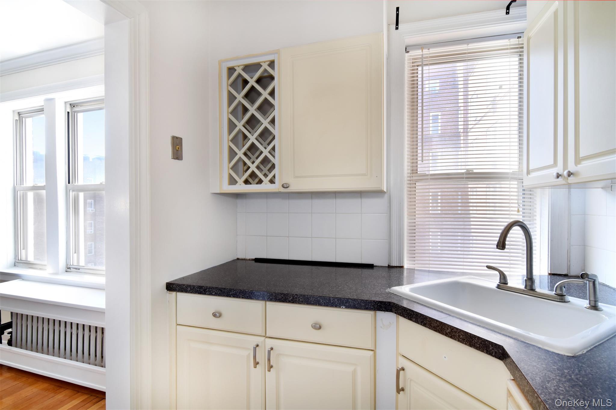 280 Bronxville Road, Unit 5W Bronxville, NY 10708 - Photo 8 of 14 A custom built wine rack adds a nice touch to the space!