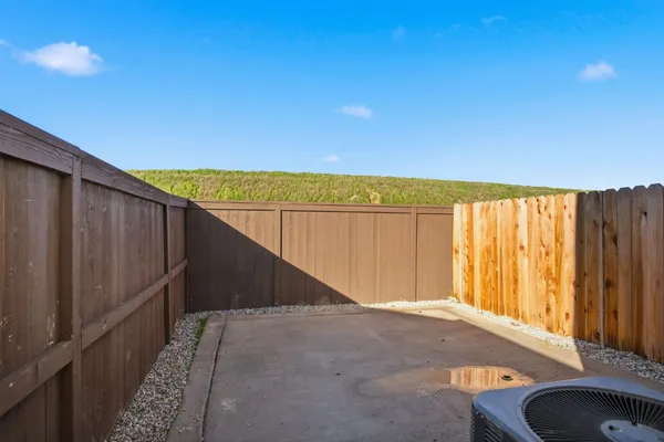 a view of a balcony with an outdoor space