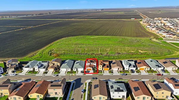 a view of a city with an ocean beach