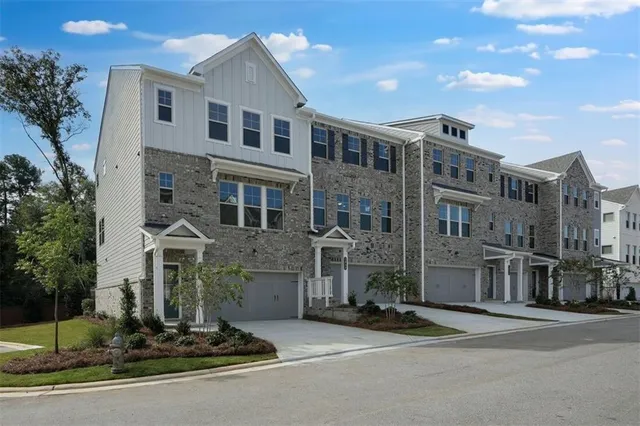 a front view of a building with street view