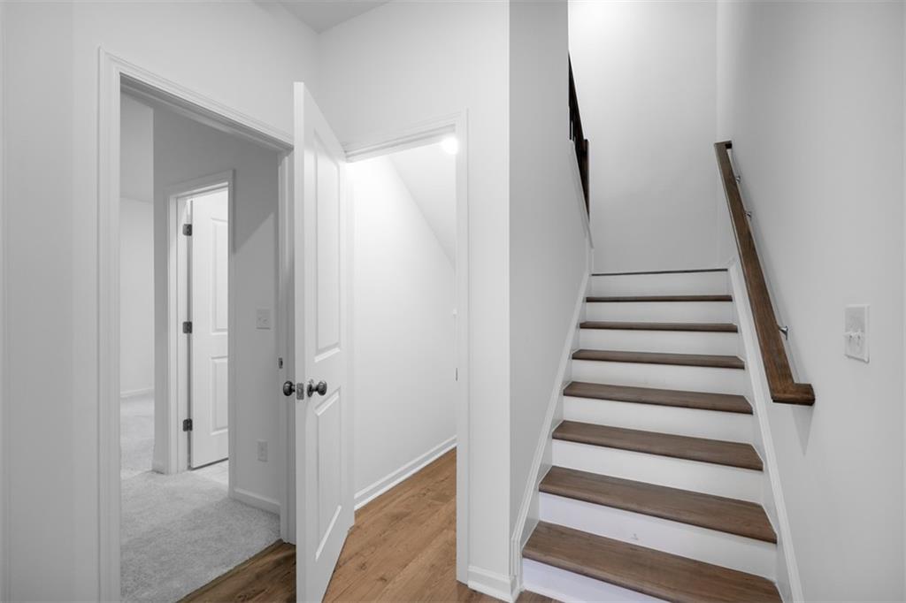 1701 Lansmere Street Southwest Marietta, GA 30008 - Photo 14 of 29 a view of entryway with wooden floor and stairs