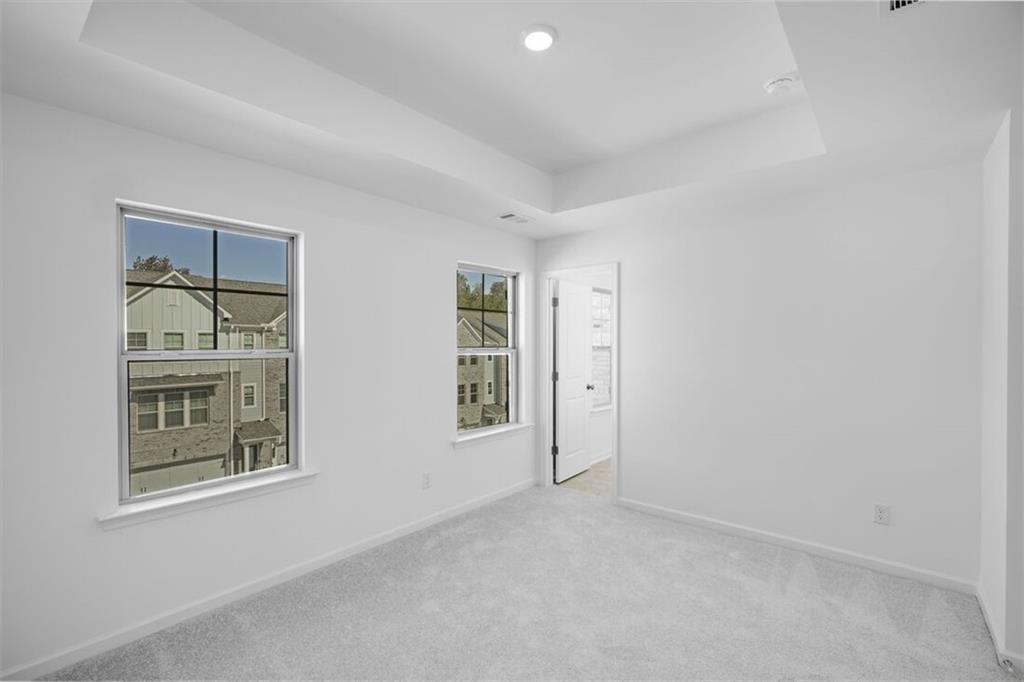 1701 Lansmere Street Southwest Marietta, GA 30008 - Photo 3 of 29 a view of an empty room with a window