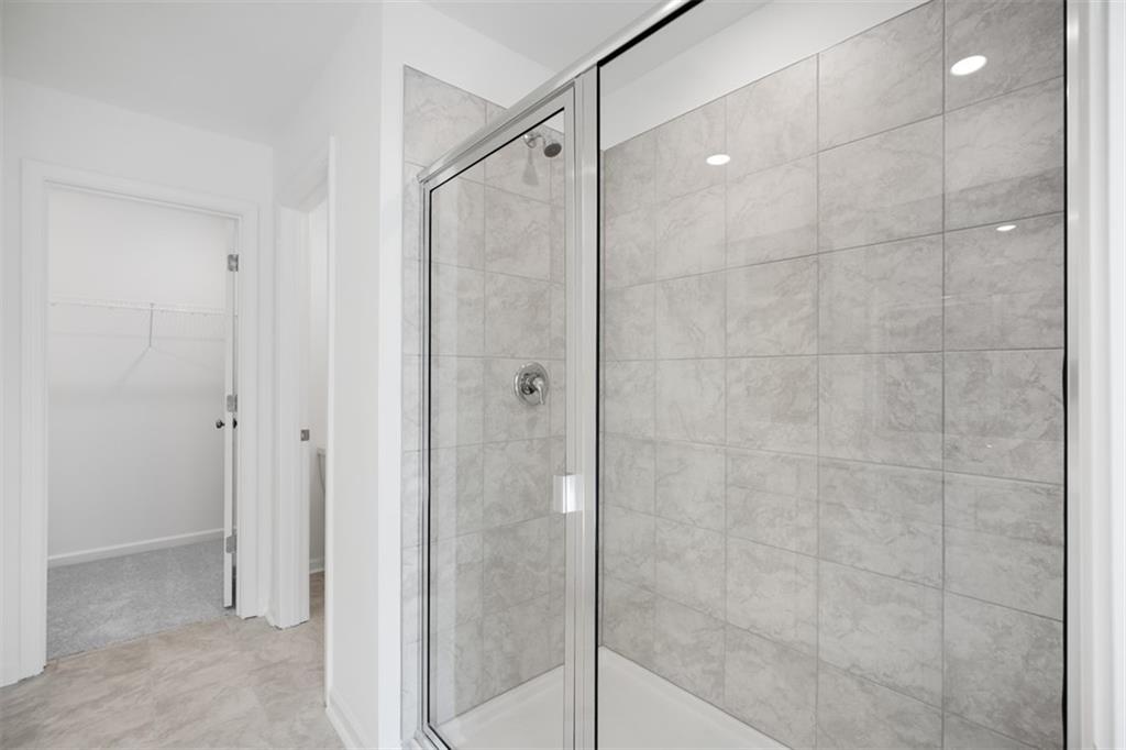 1701 Lansmere Street Southwest Marietta, GA 30008 - Photo 6 of 29 a bathroom with a shower