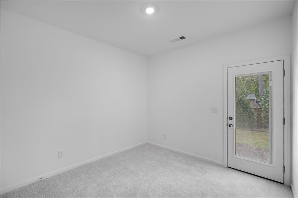 1701 Lansmere Street Southwest Marietta, GA 30008 - Photo 10 of 29 a view of an empty room