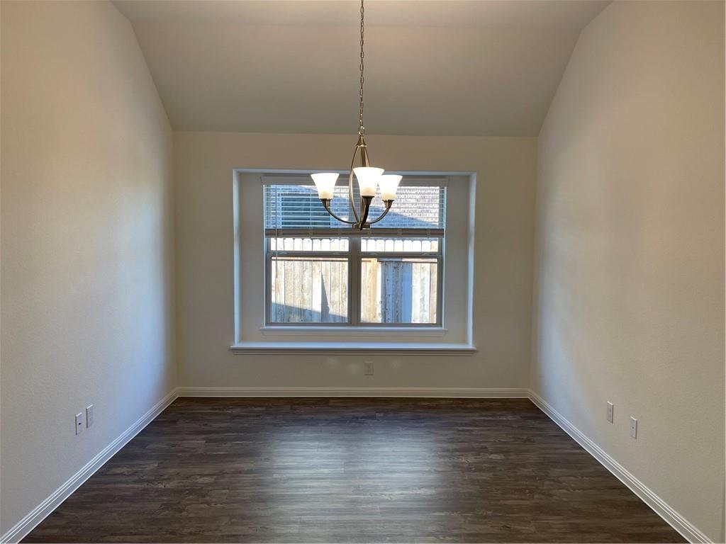 208 Baralo Street Leander, TX 78641 - Photo 19 of 23 a view of a room window and wooden floor