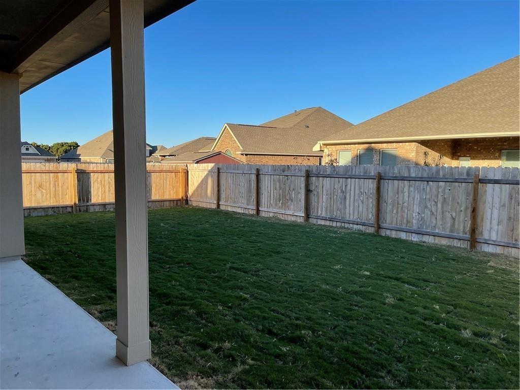 208 Baralo Street Leander, TX 78641 - Photo 21 of 23 a view of a yard with an outdoor space