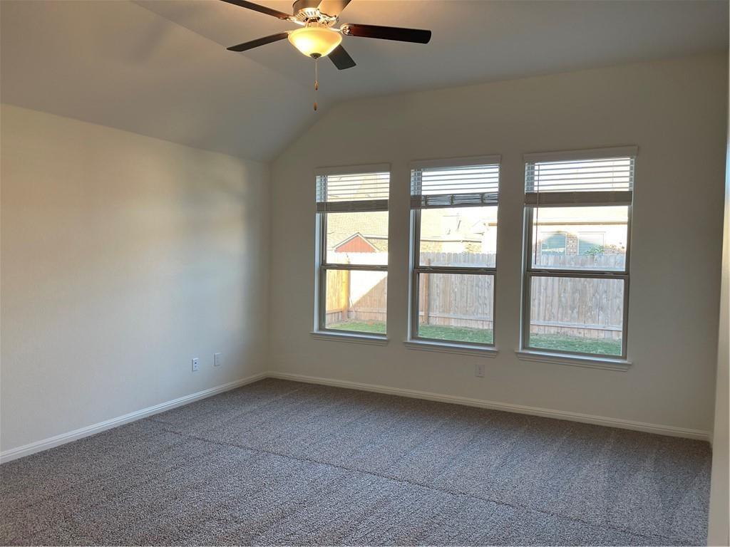 208 Baralo Street Leander, TX 78641 - Photo 9 of 23 an empty room with a window