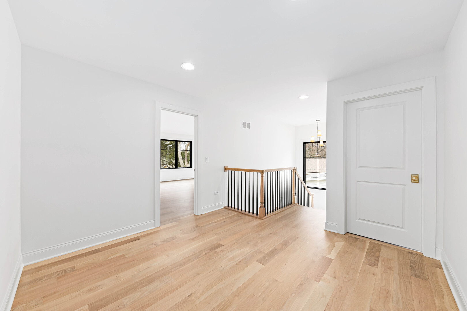 660 Eagle Street Naperville, IL 60563 - Photo 30 of 45 a view of a bedroom with wooden floor
