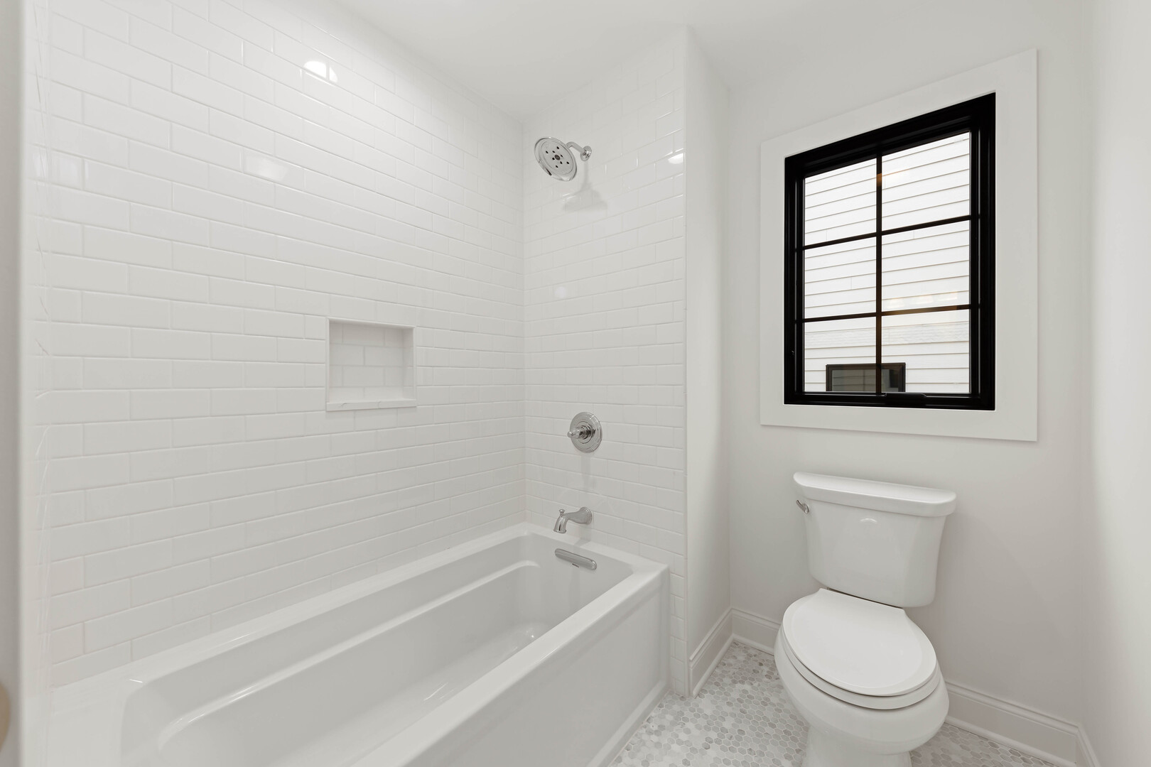 660 Eagle Street Naperville, IL 60563 - Photo 34 of 45 a bathroom with a toilet a sink and bathtub