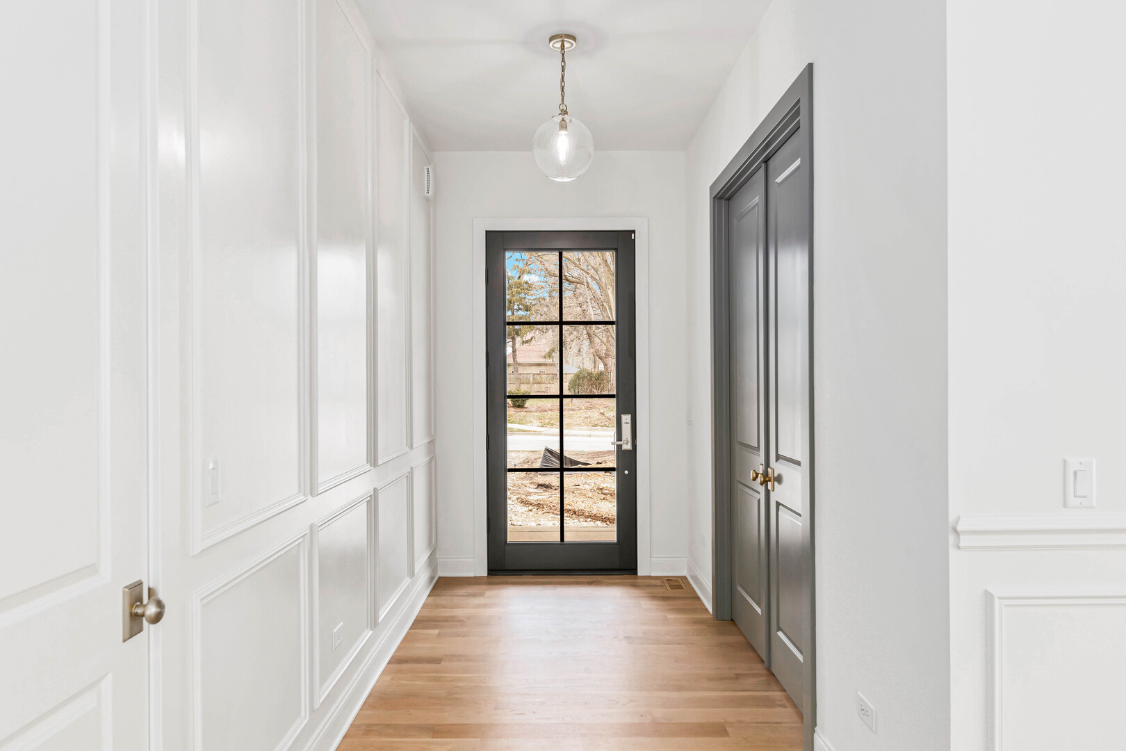660 Eagle Street Naperville, IL 60563 - Photo 4 of 45 a view of a room with wooden floor and windows