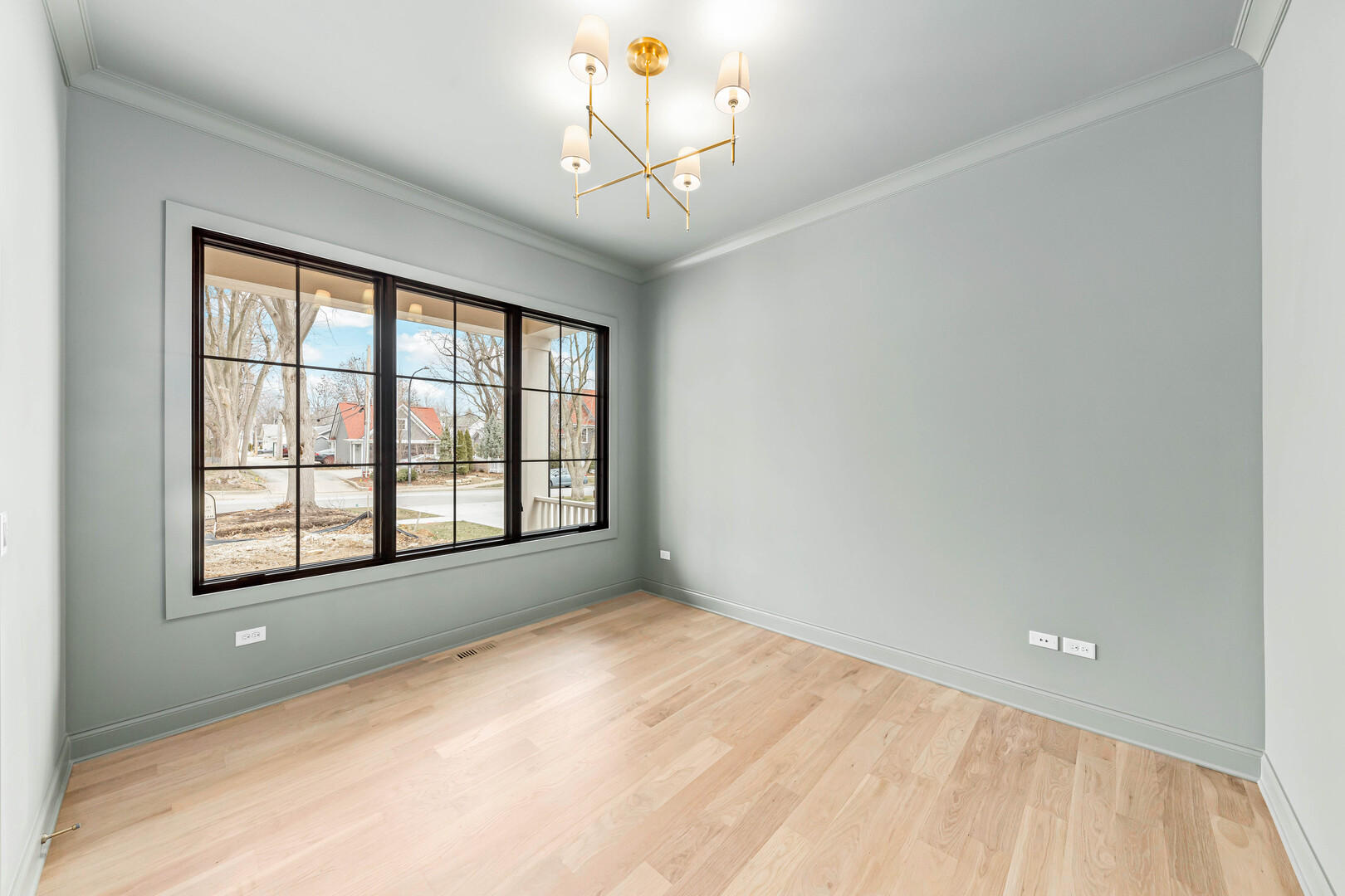 660 Eagle Street Naperville, IL 60563 - Photo 5 of 45 a view of an empty room with a window