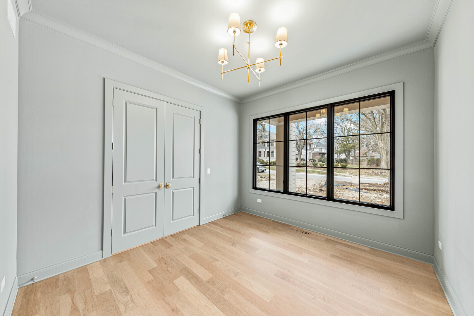 660 Eagle Street Naperville, IL 60563 - Photo 6 of 45 a view of an empty room with a window